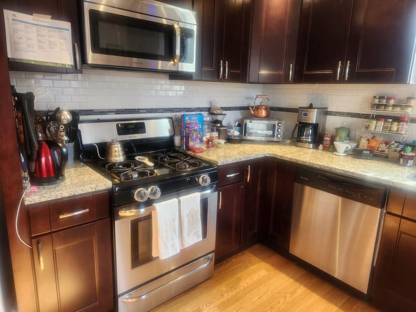 Clean and organized residential kitchen after house cleaning service